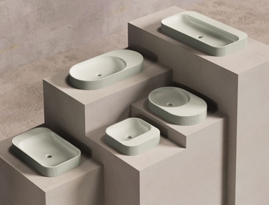 Round ceramic vessel sink with glossy white finish