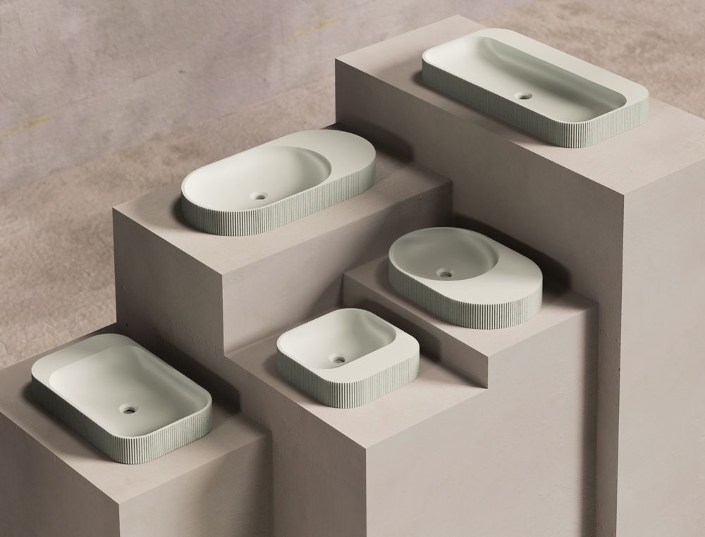 Round ceramic vessel sink with glossy white finish
